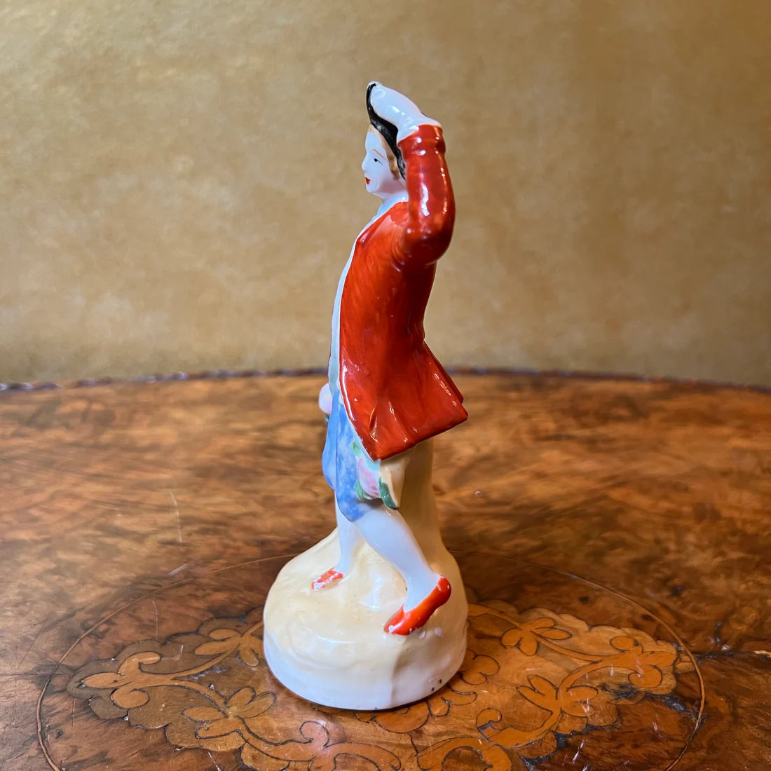 Vintage Red Coat Man Figurine Statue