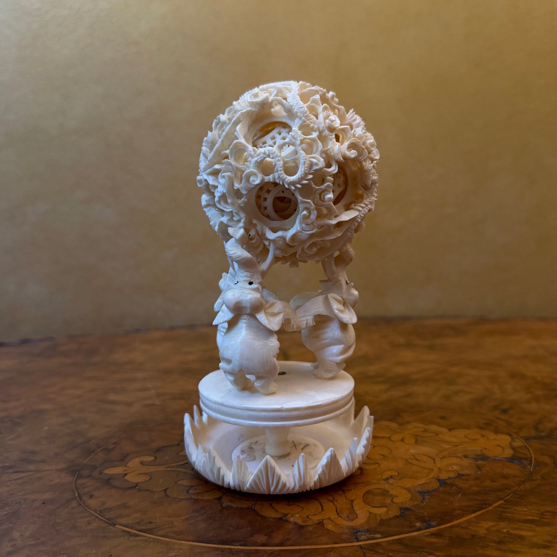 Chinese Ivory Elephants Holding A Puzzle Ball