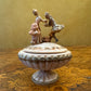Depose Italian Lady and Man Trinket