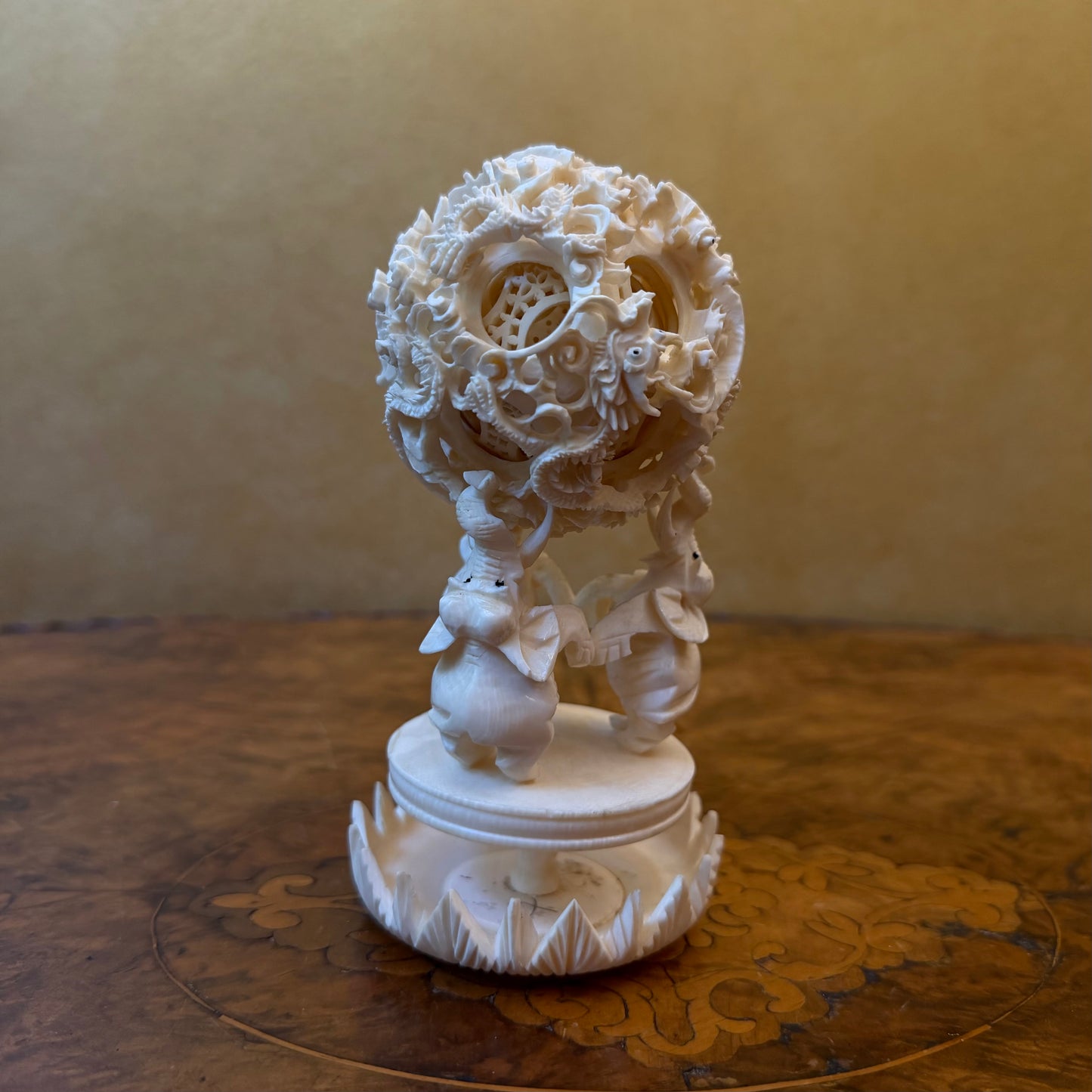 Vintage Chinese Ivory Elephants Holding A Puzzle Ball