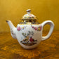 The Victoria & Albert Museum Franklin Mint 12 Tea Pots & Cabinet Set