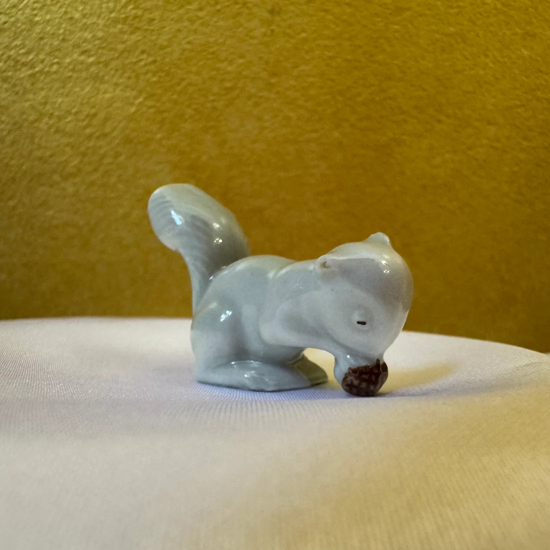 Vintage Miniature Squirrel Eating A Nut