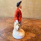 Vintage Red Coat Man Figurine Statue