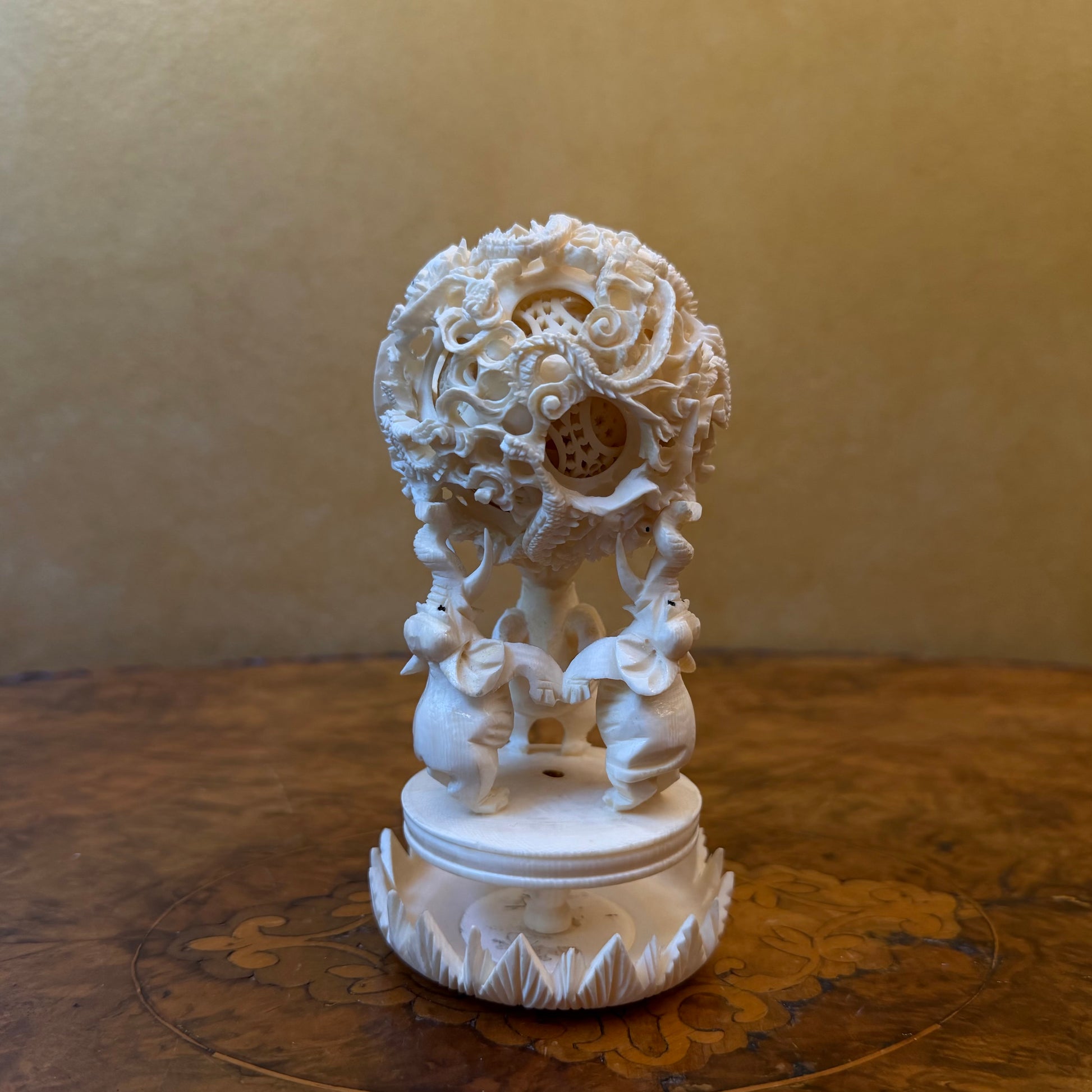 Vintage Chinese Ivory Elephants Holding A Puzzle Ball