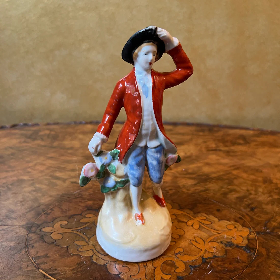 Vintage Red Coat Man Figurine Statue