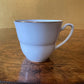 White & Gold Trim Tea Cup & Saucer